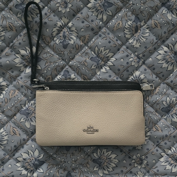Coach Handbags - Coach Beige and Black Wristlet Clutch